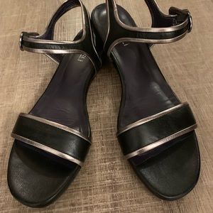 Black 11S sandals with silver trim